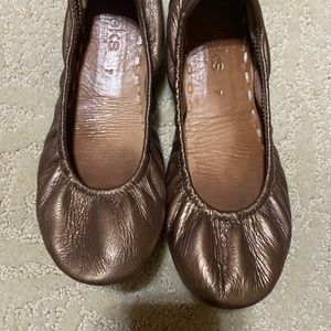 Metallic bronze tieks